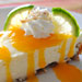 Coconut-Lime Cheesecake with Mango Coulis