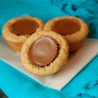 Peanut Butter Cup Cookies - Peanut butter cups wrapped in a peanut butter cookie for the most peanut buttery of treats.