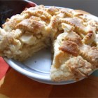 Apple Pie by Grandma Ople - A unique and popular recipe. Sliced apples under a lattice crust get bathed with a sweet buttery sauce before baking.