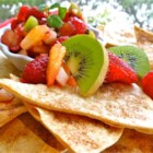 Annie's Fruit Salsa and Cinnamon Chips - This delicious salsa made with fresh kiwis, apples and berries is a sweet, succulent treat when served on homemade cinnamon tortilla chips. Enjoy it as a summer appetizer or an easy dessert.