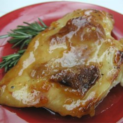 Hawaiian Chicken II Recipe - Chicken baked in an ever-popular sweet and sour sauce enhanced with orange juice, sugar and wine.