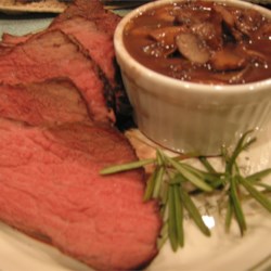 Boneless Garlic and Rosemary Rubbed Prime Rib with Red Wine Mushroom Sauce