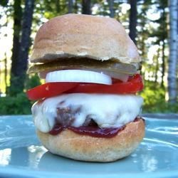 Jalapeno-Blue Cheese Burgers Recipe - Blue cheese, jalapeno and Swiss cheese round out these huge grilled burgers. These delicious burgers will make you think twice about eating chicken!