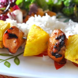 Hawaiian Chicken Kabobs Recipe and Video - A light marinade of soy sauce, brown sugar, and sherry with sesame and spices tenderizes these chicken pineapple kabobs into an aloha grilled dream of a dish!