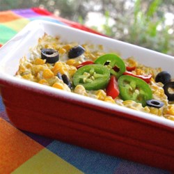 Spicy and Cheesy Creamed Corn Recipe - This creamy mixture of corn, jalapeno peppers, and canned green chilies is sure to become a favorite side dish of fans of spicy food.