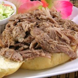 Kalua Pig in a Slow Cooker Recipe and Video - Slow-cooker pork butt roast with delicious smoky taste.