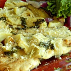 Chicken with Lemon Artichoke Sauce Recipe - A creamy lemon and artichoke sauce makes simply-seasoned pan-fried chicken breasts a delightful weeknight treat.