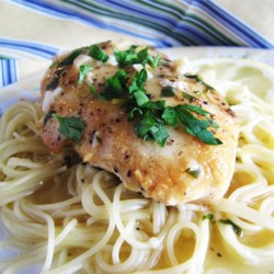Slow Cooker Lemon Garlic Chicken II Recipe and Video - Seasoned, browned chicken breasts slow cooked with lemon juice, garlic, and chicken bouillon. A wonderful 'fix and forget' recipe that is easy and pleases just about everyone. Great served with rice or pasta, or even alone.