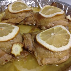 Baked Lemon Chicken Thighs with Mushroom Sauce Recipe - Chicken thighs are brined in a mixture of lemon juice and savory seasonings to keep them super moist. Baked with layers of fresh lemon and served with a quick mushroom sauce, this meal is sure to impress.