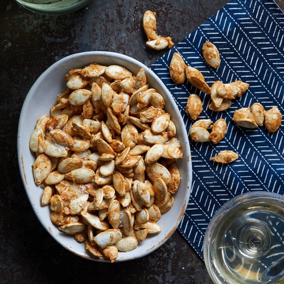 garlic-parmesan-roasted-pumpkin-seeds-recipe-eatingwell