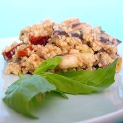 Photo on Couscous accompanied by Mushrooms and Sun-Dried Tomatoes by RUTH GOOCH