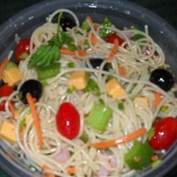 Photo about Cold Spaghetti Salad through JENNIFER J