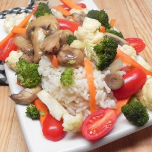 Easy Vegan Stir-Fry Recipe - Cook up this fresh vegan stir-fry seasoned with soy sauce and basil that goes well over hot rice with a sprinkling of sunflower seeds.
