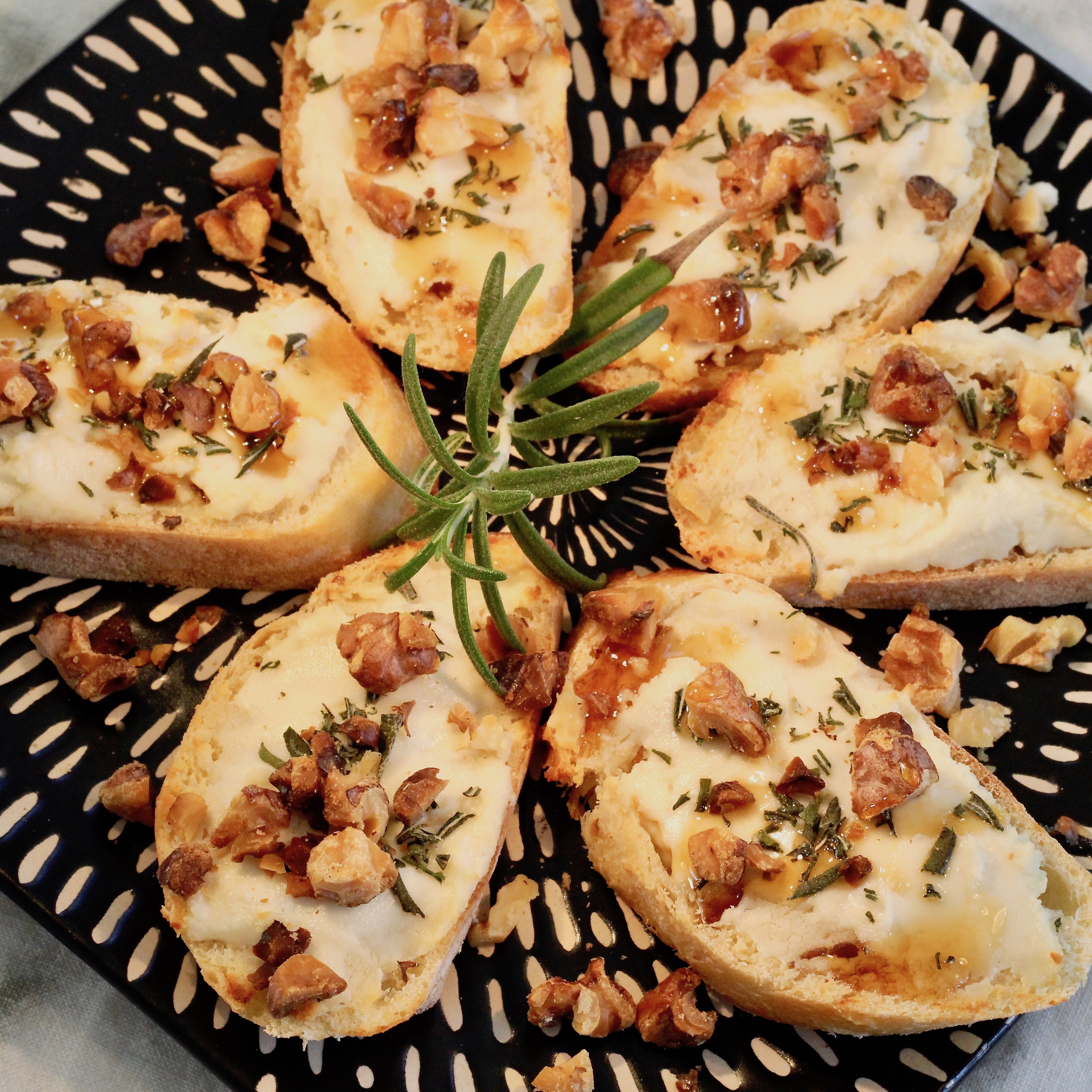 Rosemary and Goat Cheese Crostini with Walnuts and Honey image