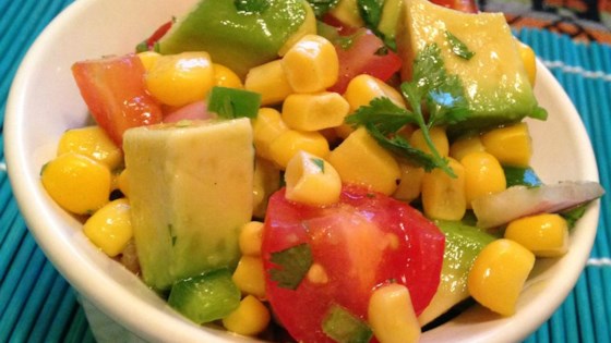 Photo about Corn Salad in the company of Lime Vinaigrette by Jen