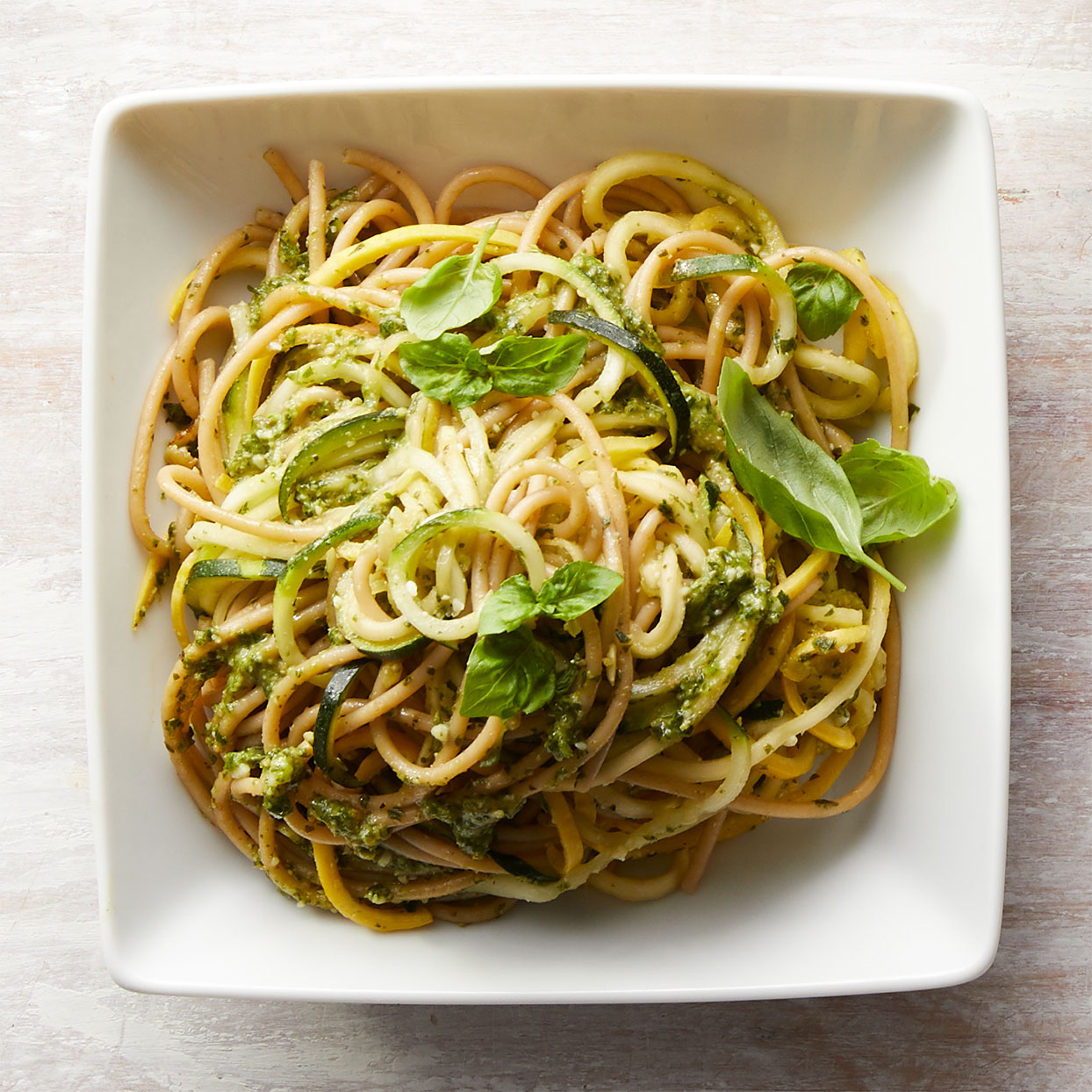 Spaghetti &amp; Zucchini Noodles with Basil-Walnut Pesto Recipe | EatingWell