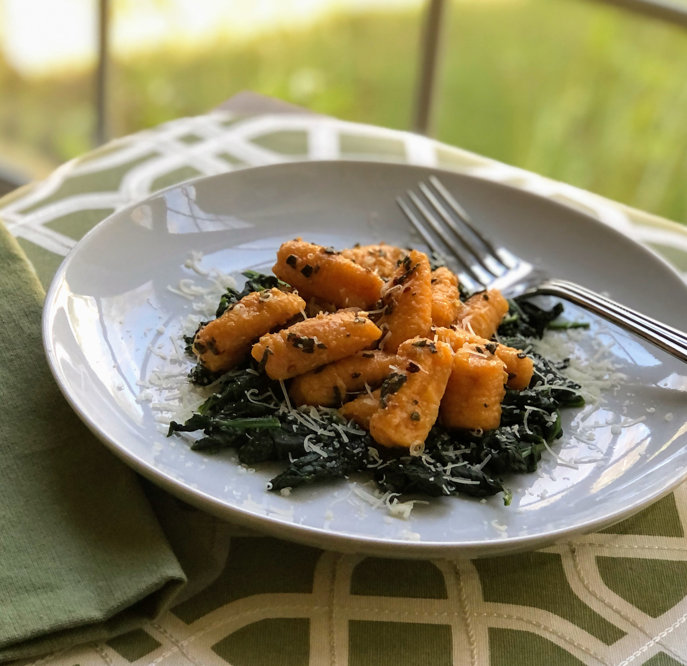 Butternut Squash Gnocchi with Garlic-Sage Butter over Wilted Spinach_image