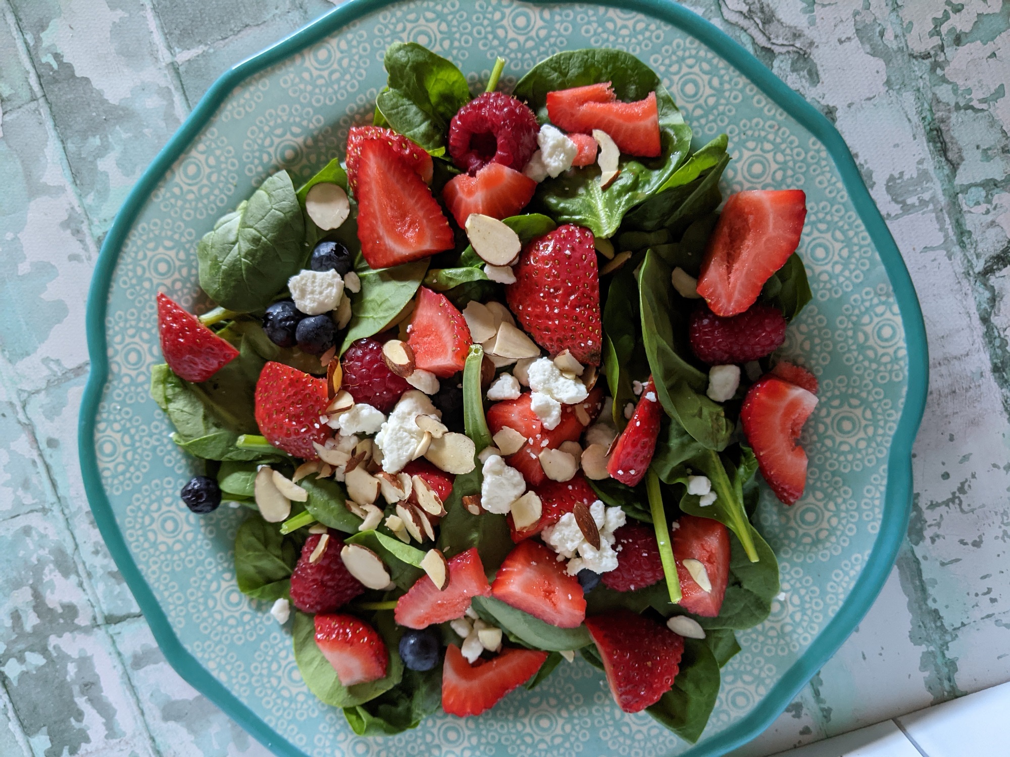 Spinach Salad with Berries and Goat Cheese image