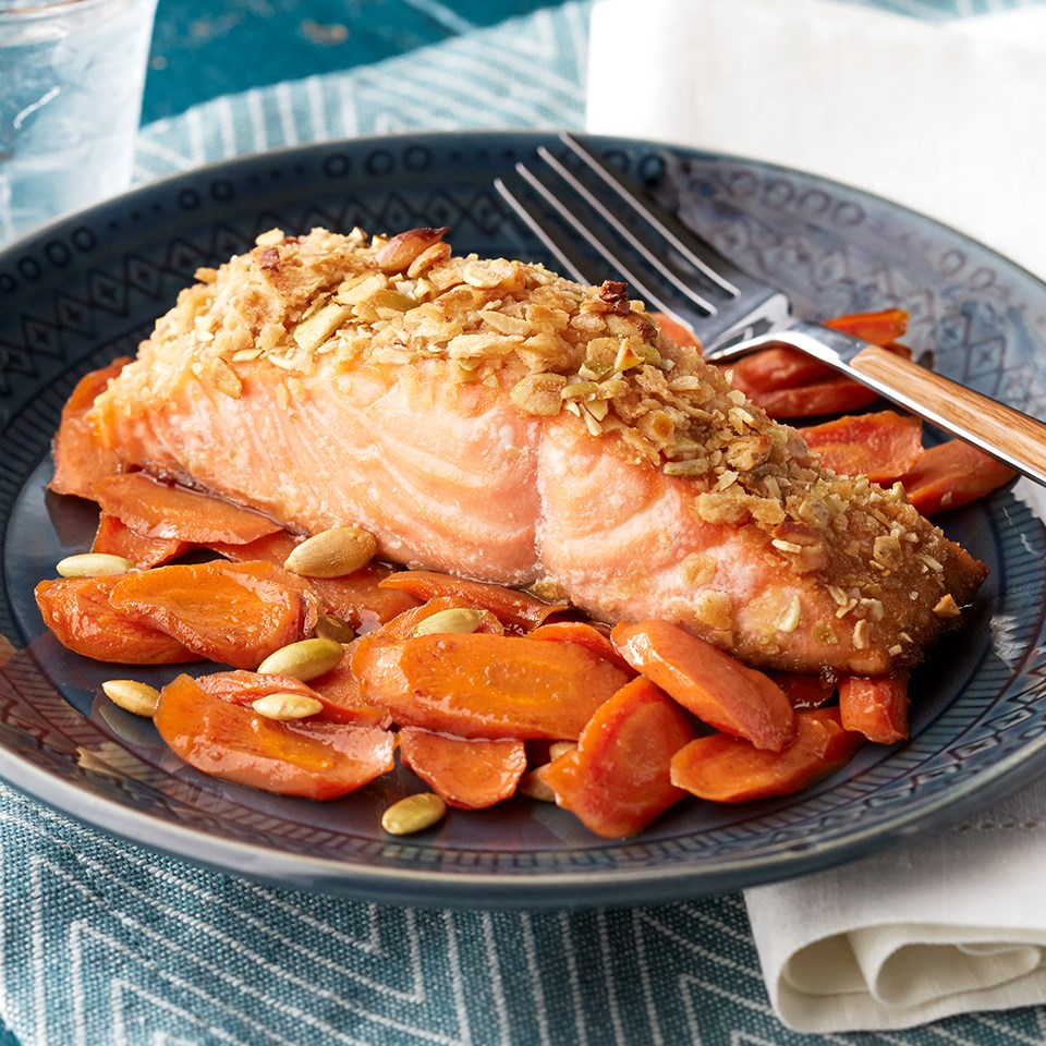 Pumpkin Seed Salmon with Maple-Spice Carrots Recipe - EatingWell